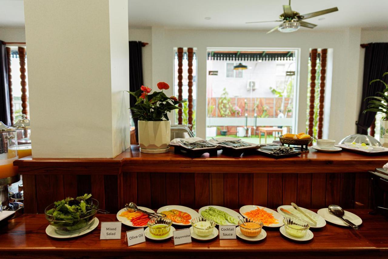 Two Seasons Siem Reap Hotel Екстер'єр фото A selection of dishes at a buffet