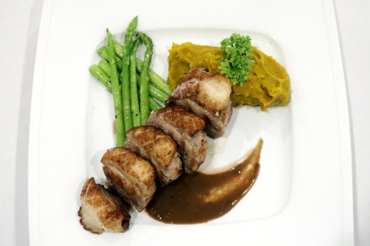 Two Seasons Siem Reap Hotel Екстер'єр фото A prepared meal of frog legs